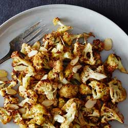 Roasted cauliflower with spiced almond topping